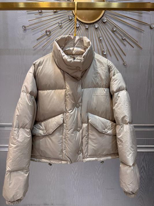 MU Sand colored down jacket
