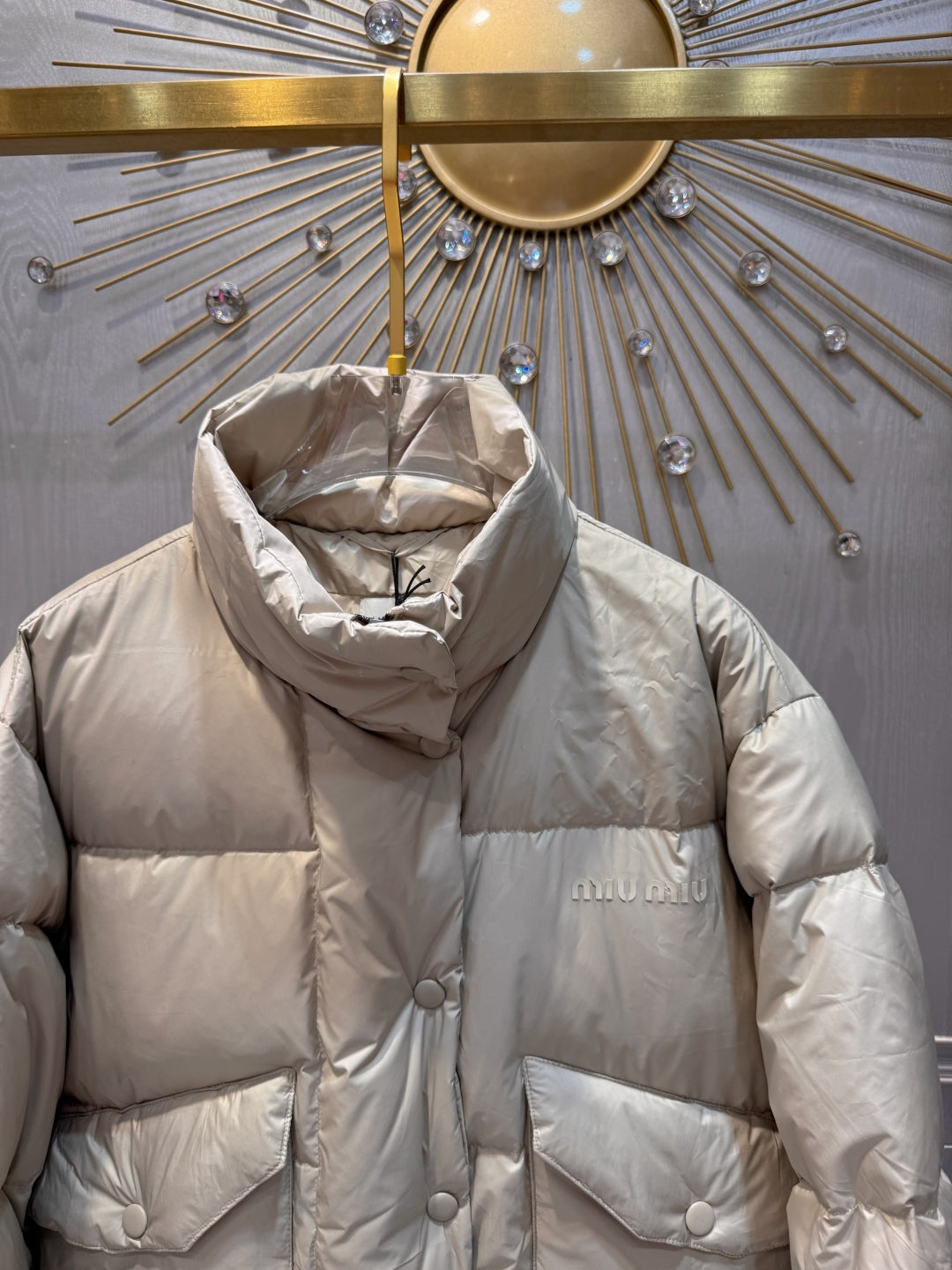 MU Sand colored down jacket