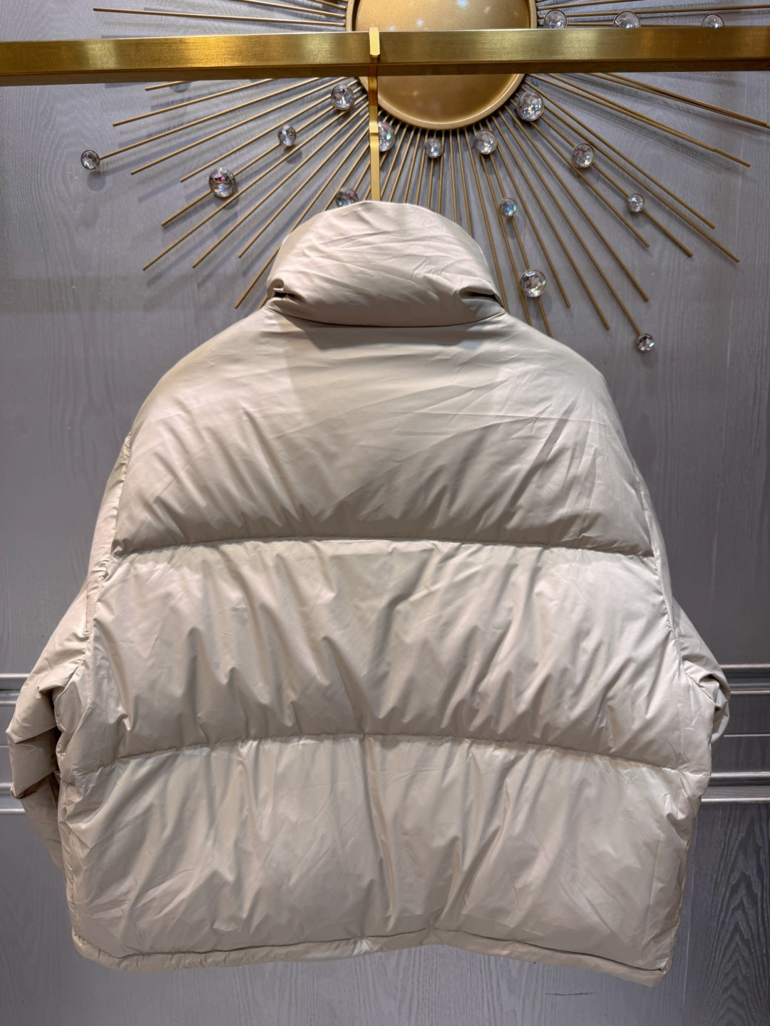 MU Sand colored down jacket