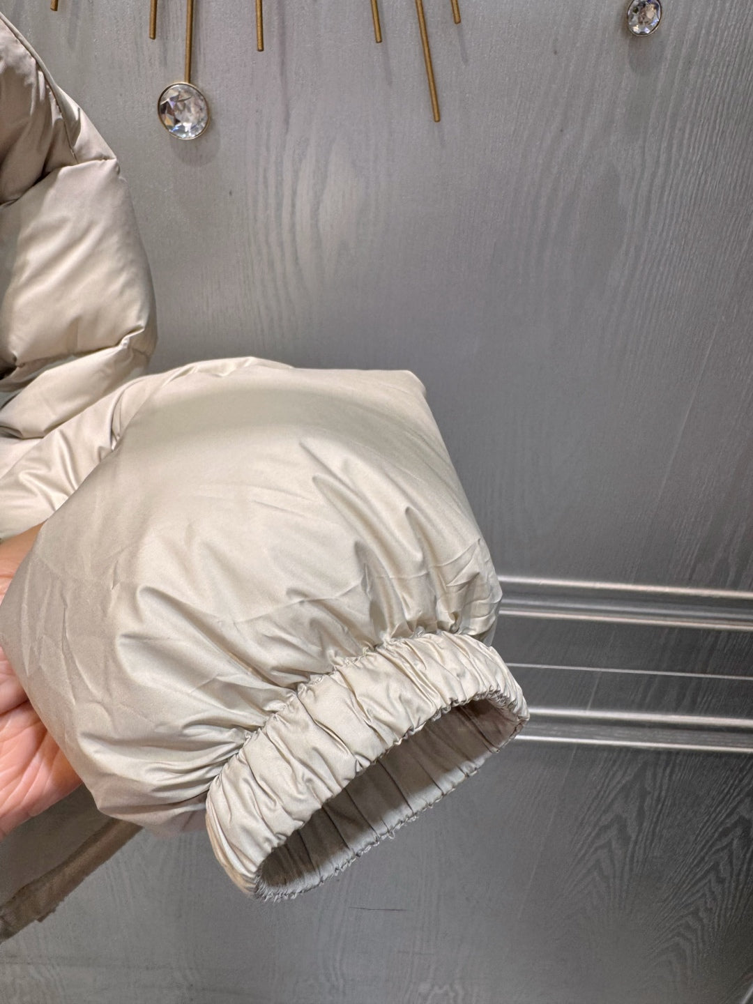 MU Sand colored down jacket