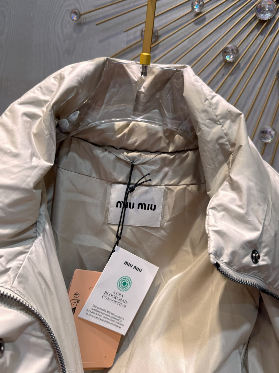 MU Sand colored down jacket