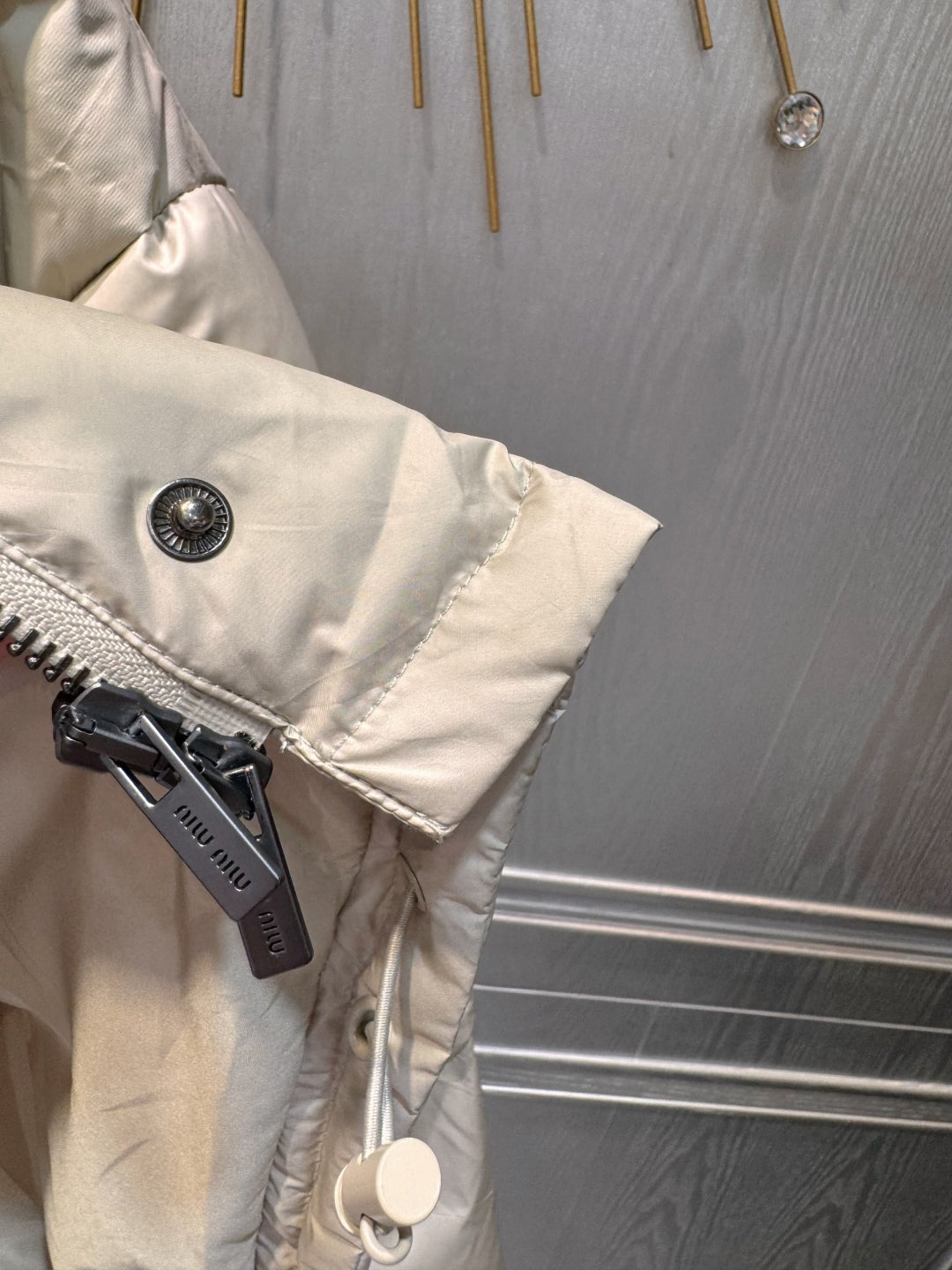 MU Sand colored down jacket