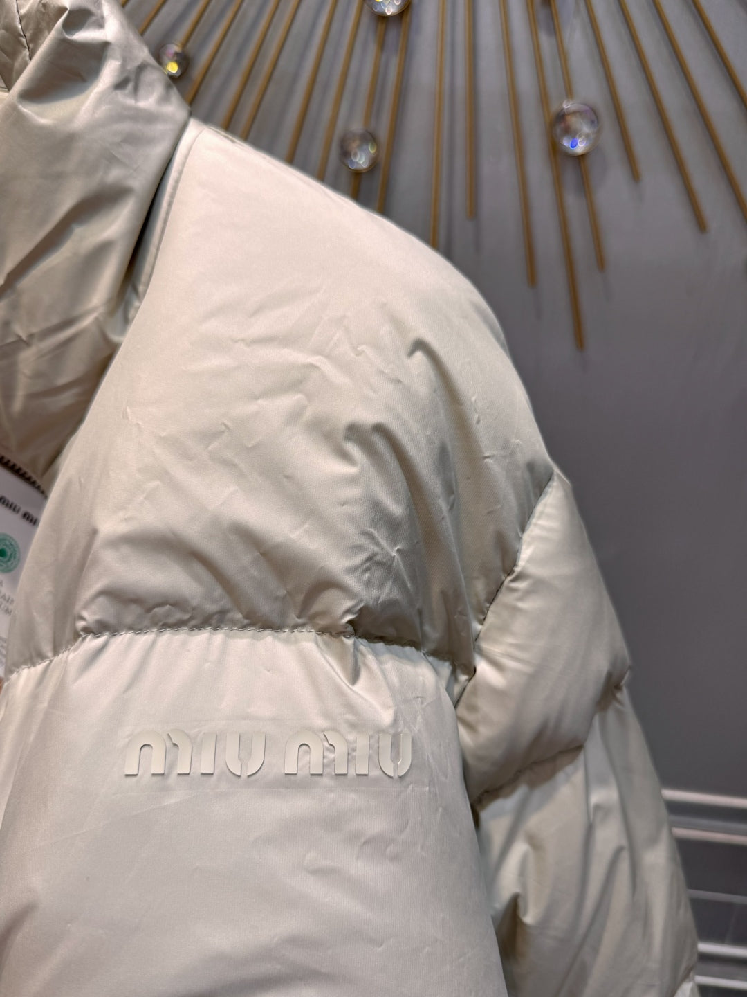 MU Sand colored down jacket