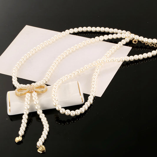CD Bow Pearl Necklace Sweater Chain