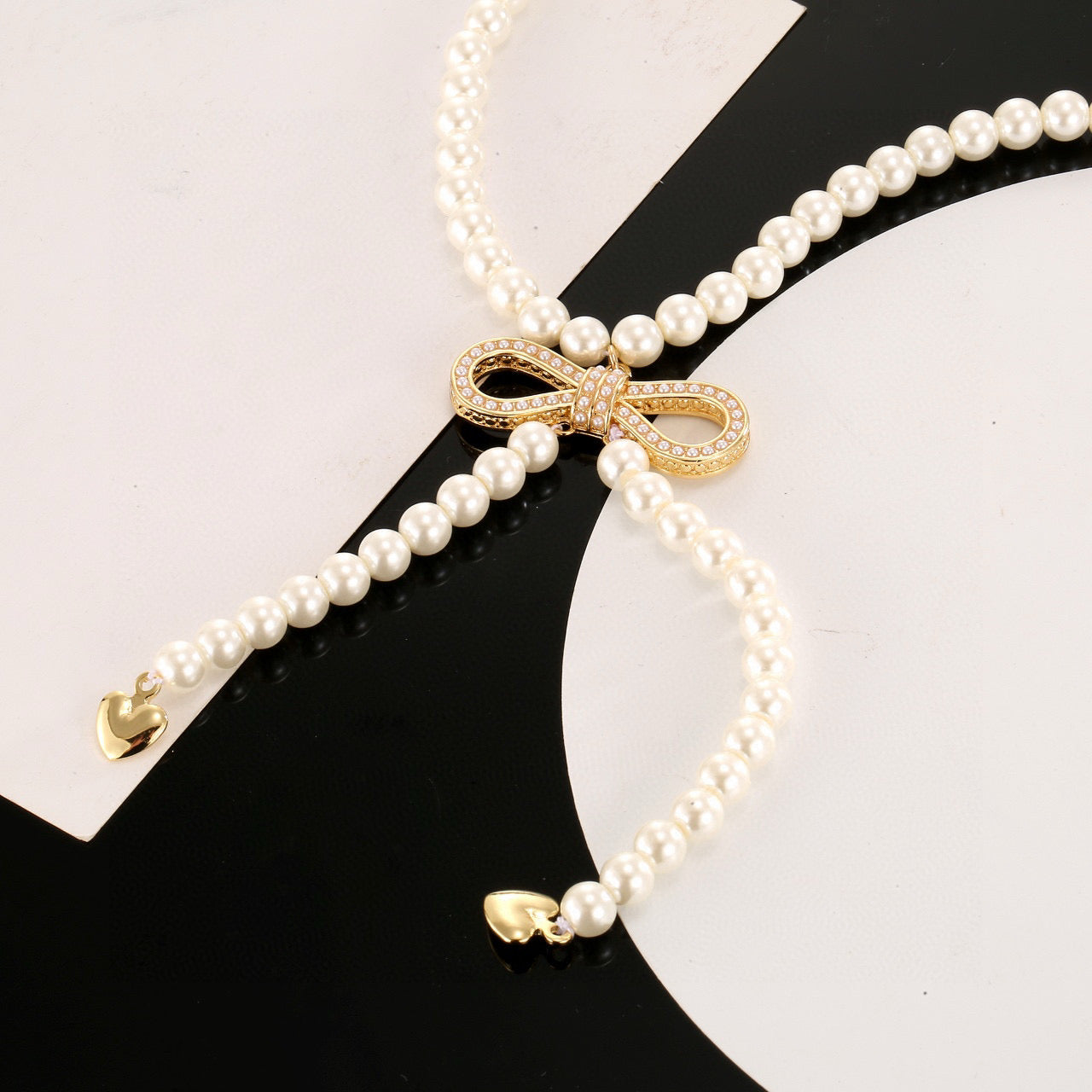 CD Bow Pearl Necklace Sweater Chain