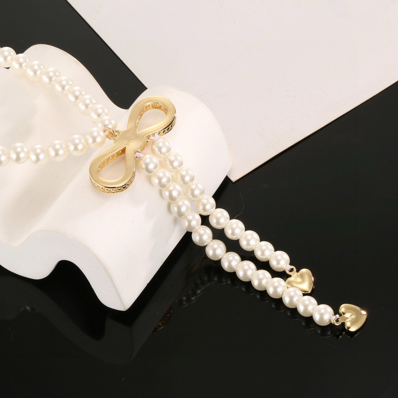 CD Bow Pearl Necklace Sweater Chain