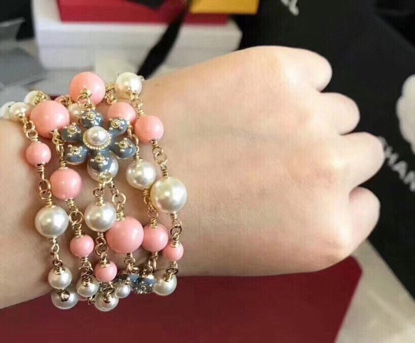 Cha**Blue floral and pearl-embellished sweater chain