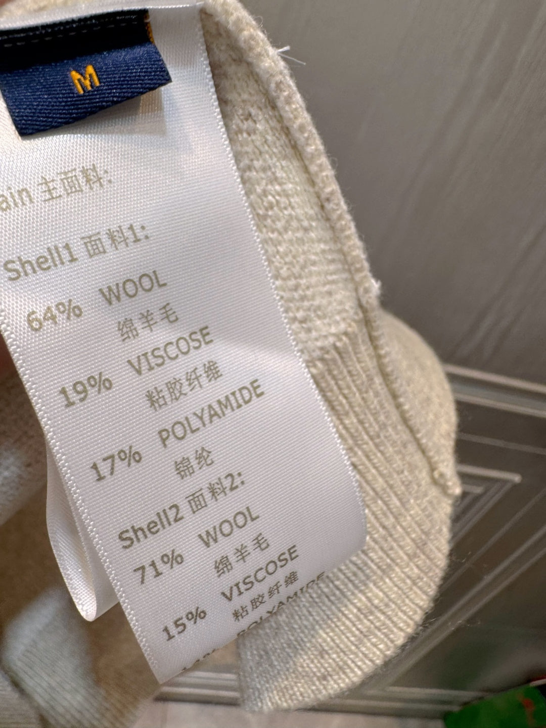 Loe**256fw Jacquard half-zip sweater, milk apricot color