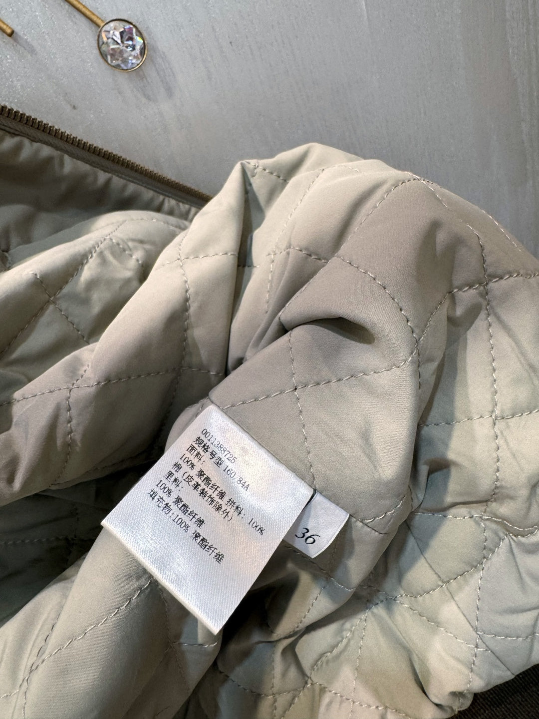 Cel**25fw new arc de Triomphe diamond-patterned quilted cotton coat