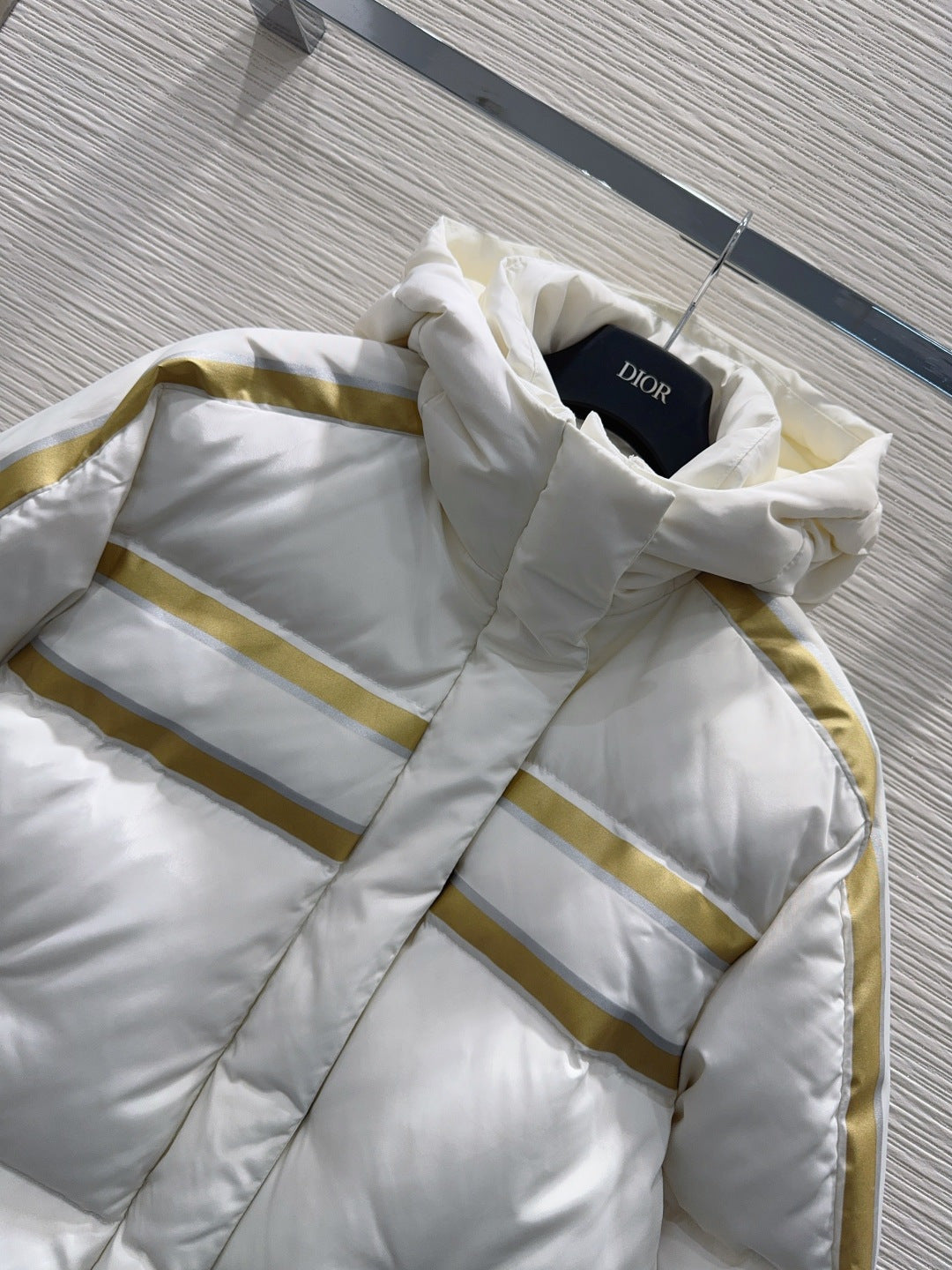 Cd 25fw down jacket with letter logo on the back